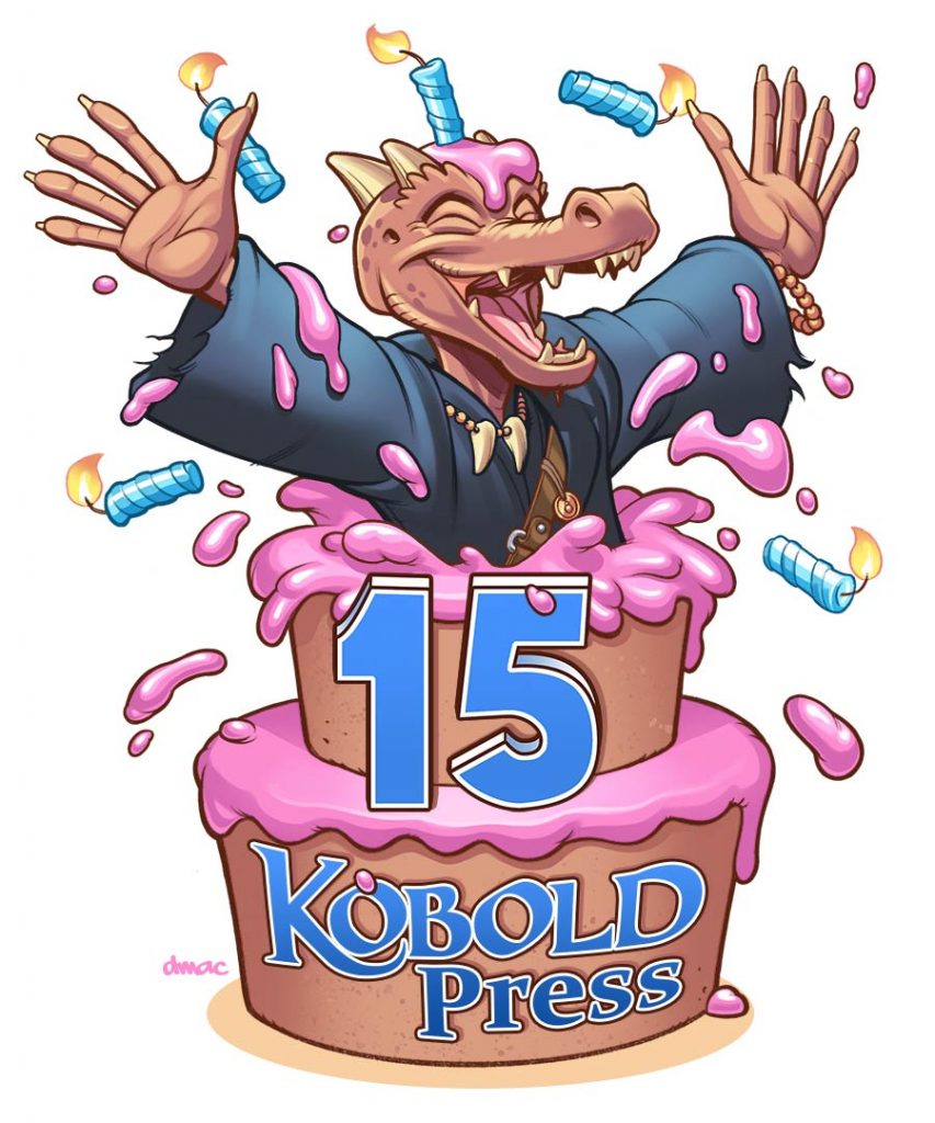 A happy kobold bursting from a cake labeled 15